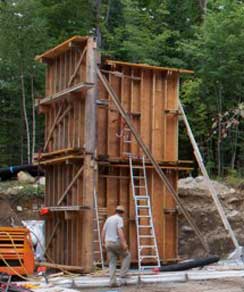 Sustainable footings for a rammed earth structure