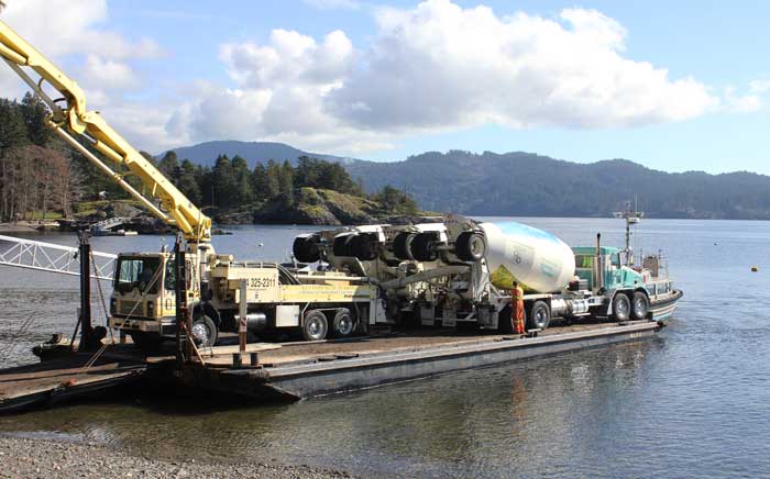 Unloading concrete from barge